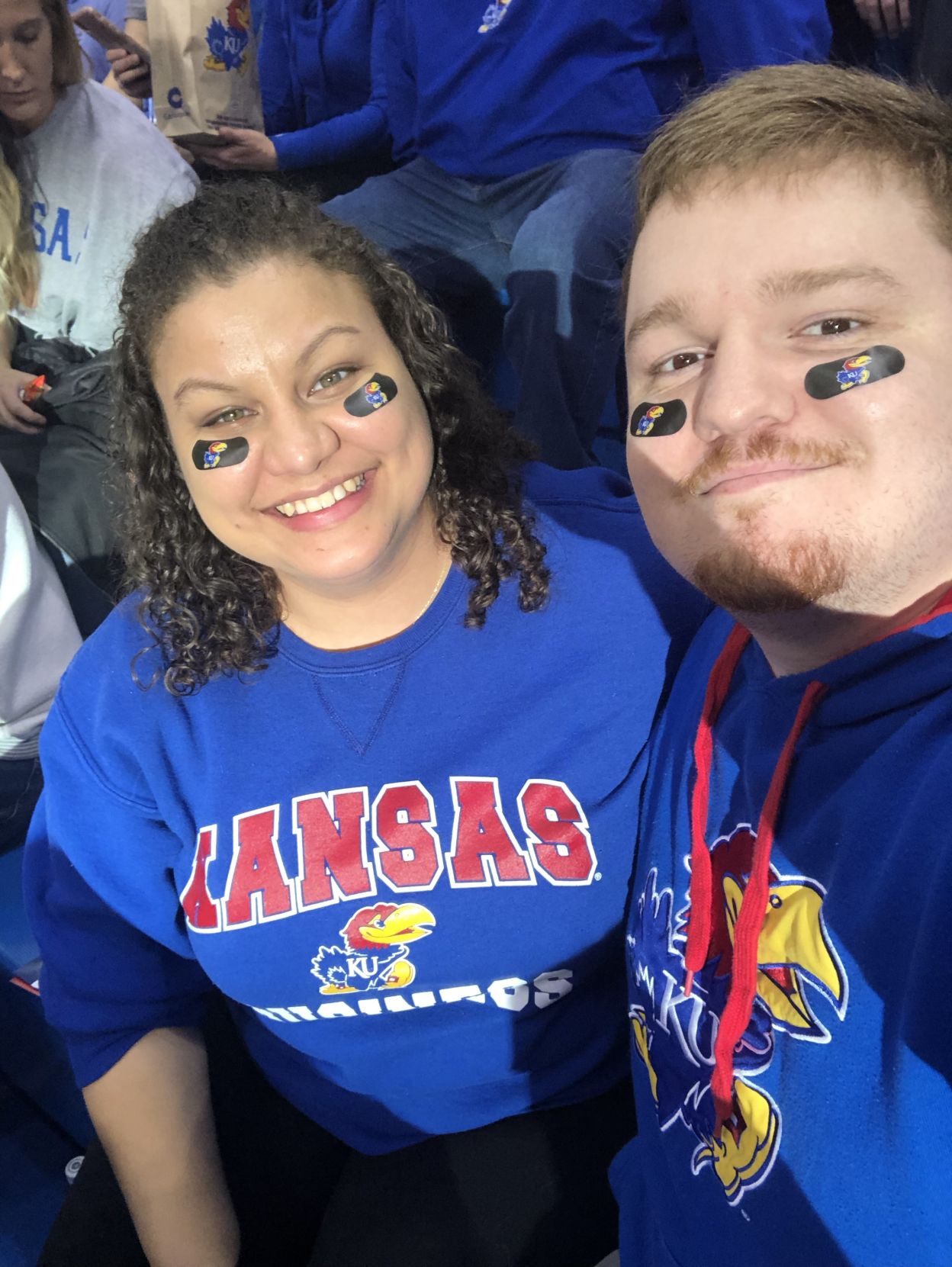 Rachel and Justin Thomas sport K.U. apparel and pose for a selfie